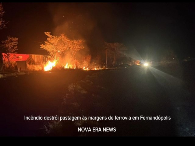 Incndio destri pastagem s margens de ferrovia em Fernandpolis